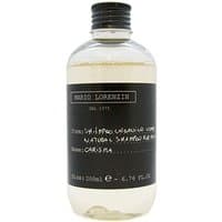 Clear bottle of Lumi CARISMA Natural Shampoo for men, 200 ml, with black label and black cap.