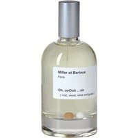 Clear glass bottle with silver cap, containing Miller et Bertaux unisex woody perfume, labeled "Oh, ooOoh ...oh."