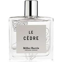 Clear glass bottle of Miller Harris Le Cedre Eau de Parfum, 100 ml, with floral design and silver cap.