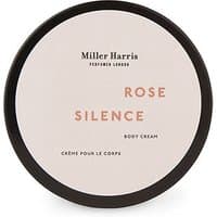 Miller Harris Rose Silence Body Cream in a round black-lidded jar with minimalist beige label, 175 ml.