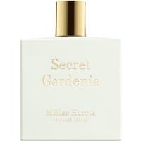 White rectangular bottle of Miller Harris Secret Gardenia Eau de Parfum with gold cap and embossed text.