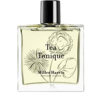Clear glass bottle of Miller Harris Tea Tonique perfume with black cap and floral illustration on label.