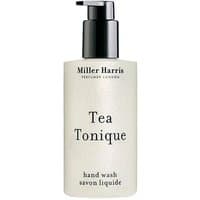Miller Harris Tea Tonique hand wash, 250 ml, in a cream bottle with black pump and minimalist text design.
