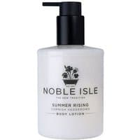 White Noble Isle Summer Rising Body Lotion, 250 ml, with black pump dispenser and floral logo on the front.