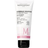 White tube of Novexpert Gommage Douceur Hydro-Biotique, 60 ml, with pink accents and black text.
