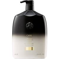 Black and gold Oribe conditioner bottle with pump dispenser and embossed logo, 1000 ml size.