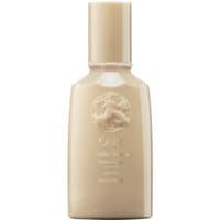Beige Oribe Matte Waves Lotion bottle, 100 ml, with embossed logo and sleek cap for hair styling and volume.