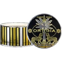 Ortigia Ambra Nera Bath Salts 500g, black and gold striped container with palm tree and leopard design on lid.