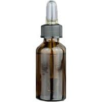 Amber glass dropper bottle with black cap, containing Ortigia Ambra Nera scented crystals.