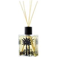 Clear glass diffuser bottle with black palm tree design, filled with yellow liquid and topped with natural reed sticks.