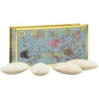 Ortigia Florio soap kit with four oval olive oil soaps and a floral-patterned blue and gold box.