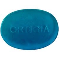 Blue oval glycerine soap with "Ortigia" embossed on top.