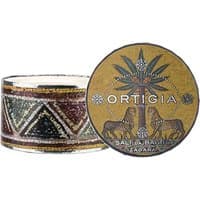 Ortigia Zagara Bath Salts 500g in a round, patterned container with palm tree and lion design on the lid.