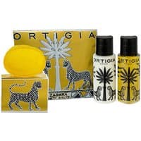 Ortigia Zagara Handbag Gift Set with yellow soap, lotion, and shower gel featuring black palm tree and leopard designs.