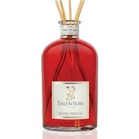 Red glass bottle of Salentum Aria di Natale 1000 ml spicy diffuser with wooden reeds and gold label.