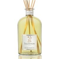 Clear glass bottle with yellow liquid, labeled "Salentum Fico e Arancio," featuring reed sticks for diffusion.