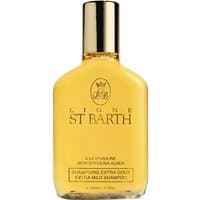 Yellow St. Barth Spirulina Extra Mild Shampoo bottle, 125 ml, with gold cap and elegant black text.