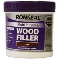 Ronseal multipurpose wood filler tub, dark color, 465g, purple and white label with black lid.