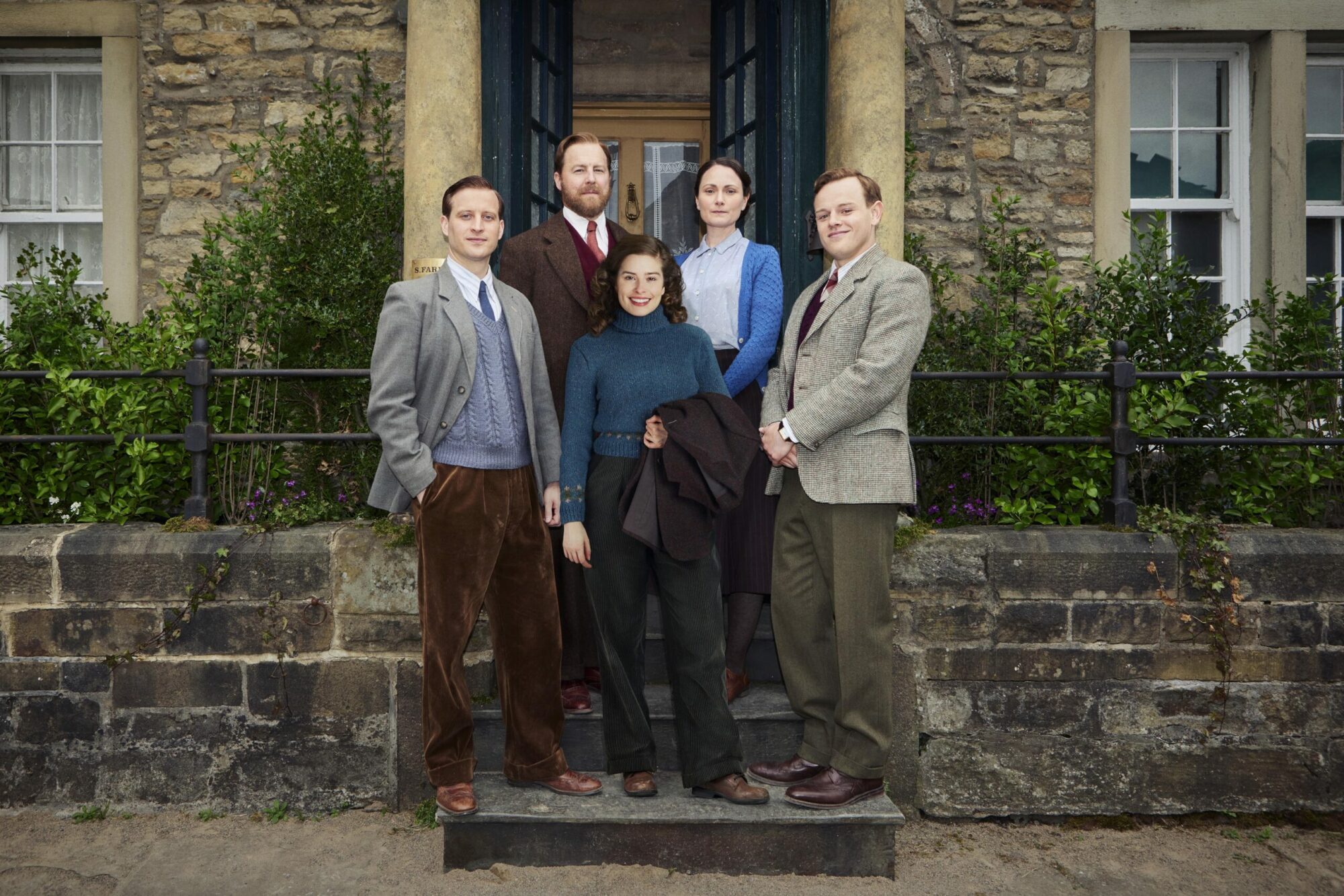 Image name FIRST LOOK 3 All Creatures Great and Small S3 Group Shot outside Skeldale L R James Siegfried Helen Mrs Hall Tristan scaled 1 the 1 image from the post All Creatures Great & Small Returns to UK Screens on Thursday 15th September 2022 in Yorkshire.com.