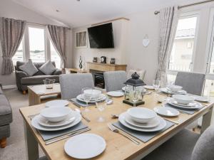 Charming lodge located on Cayton Bay Holiday Park image two