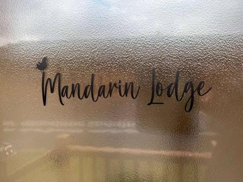 Mandarin Lodge with Hot Tub image three
