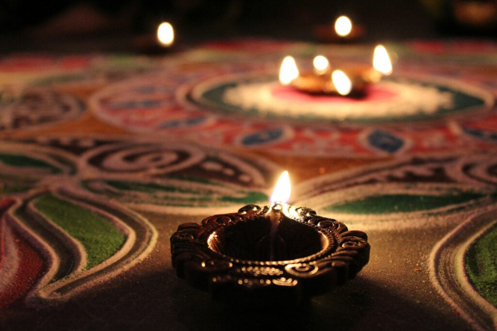 diwali oil lamp on patterned floor