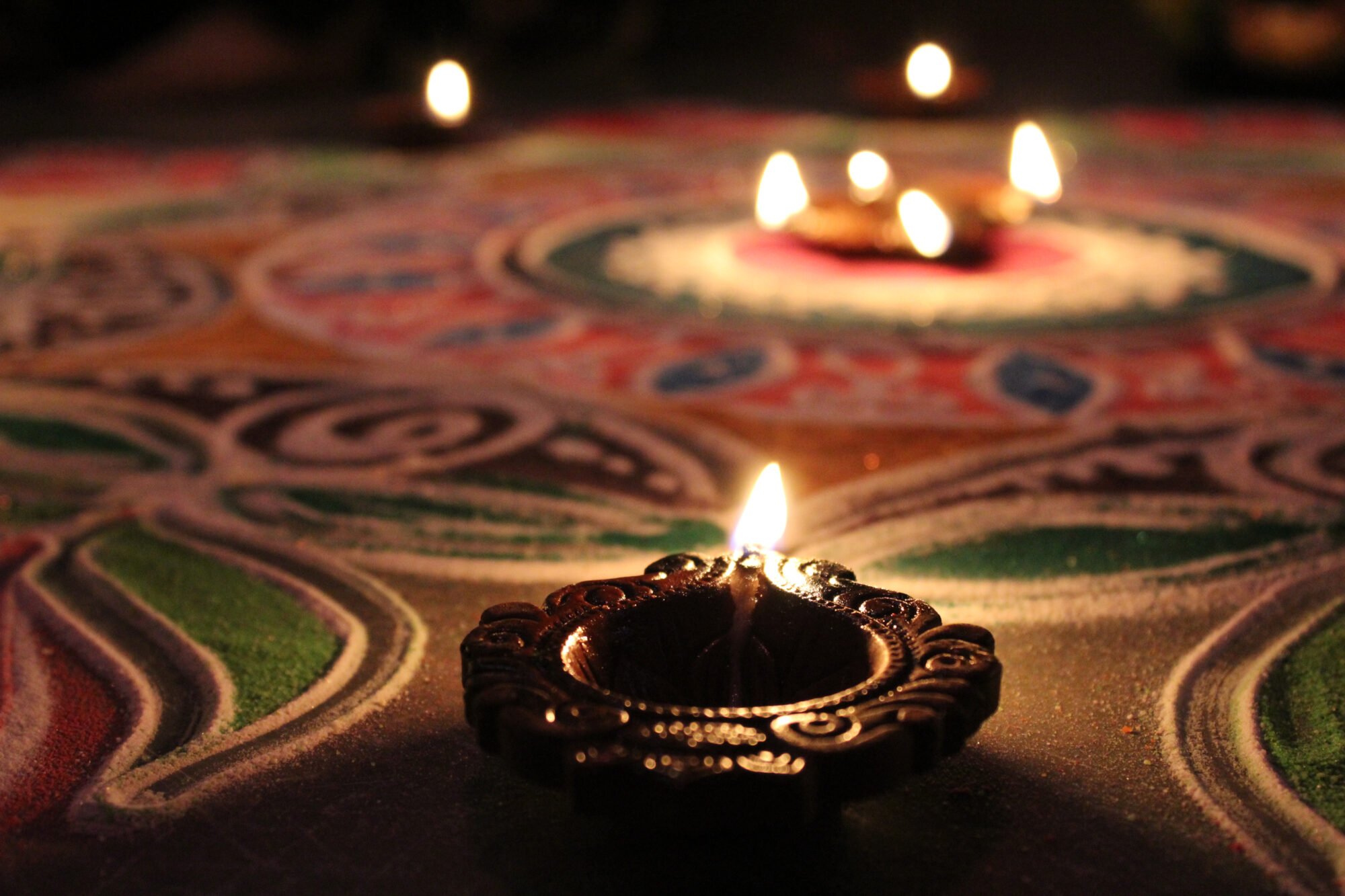 diwali oil lamp on patterned floor
