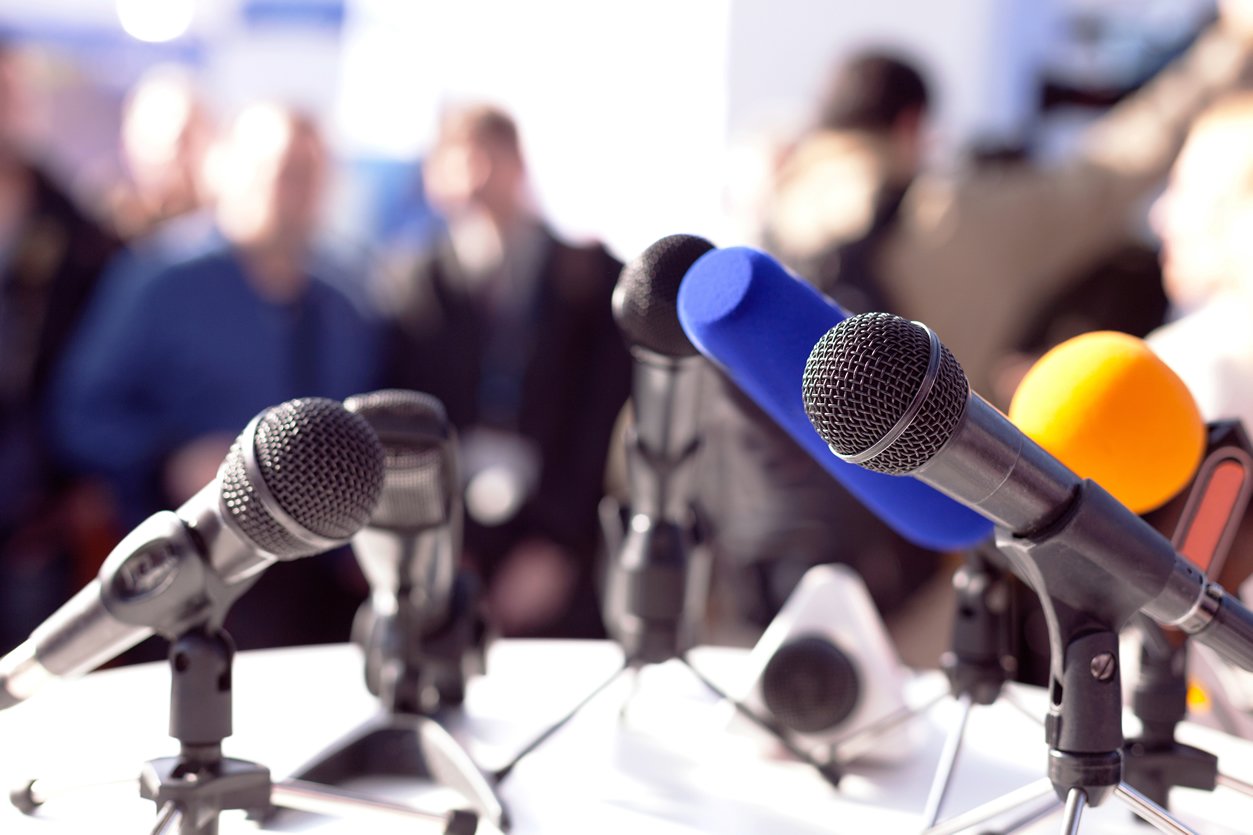 Press microphones on desk