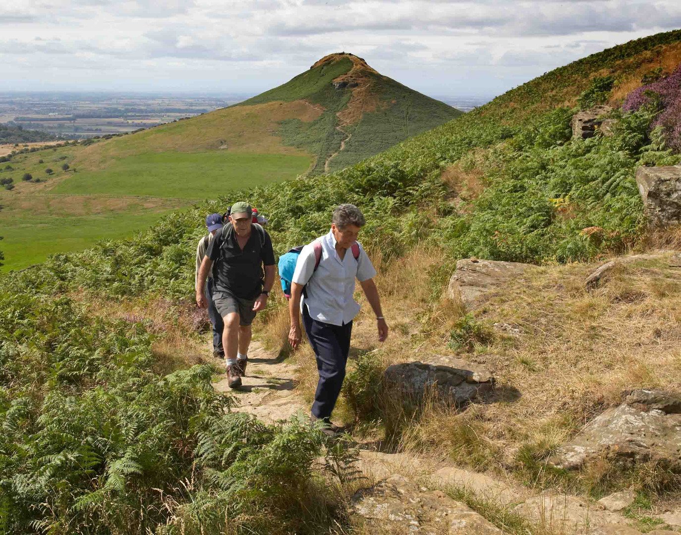 Image name walkers roseberry topping credit nymnpa and mike kipling the 2 image from the post The long and winding road in Yorkshire.com.