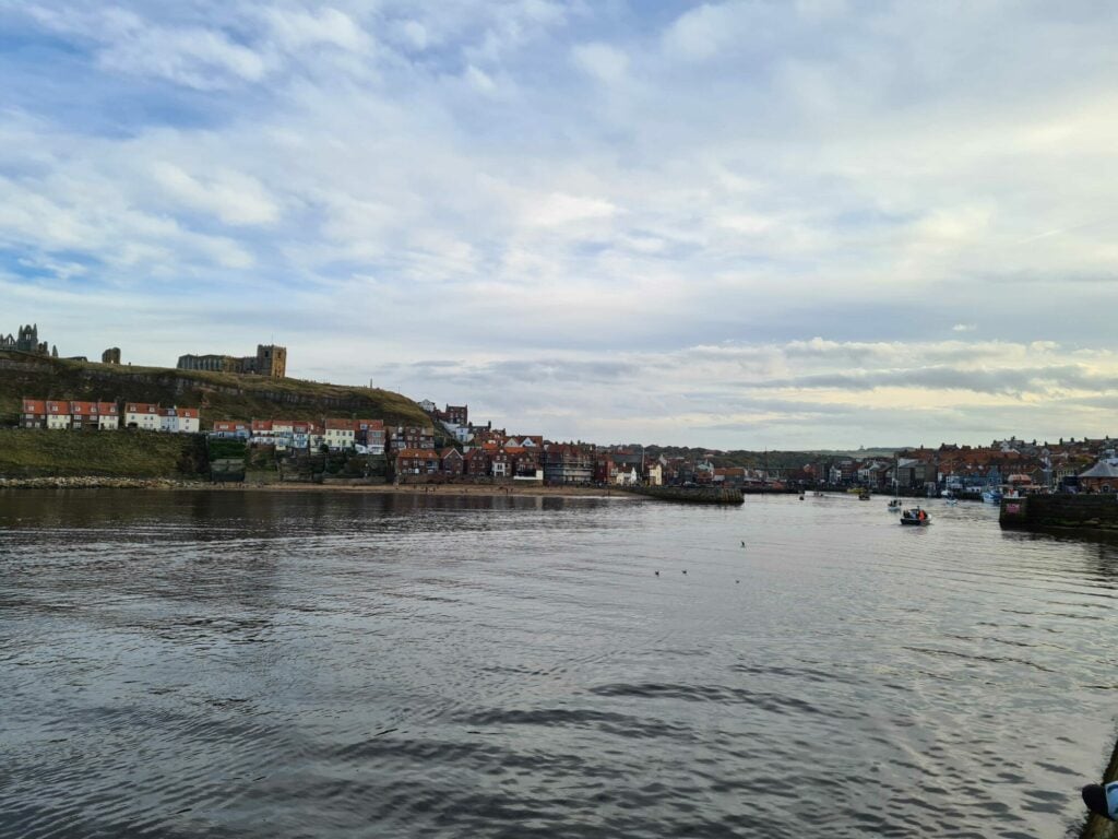 Image name whitby harbour looking in from harbour wall copyright yorkshire com international ltd the 9 image from the post Whitby in Yorkshire.com.