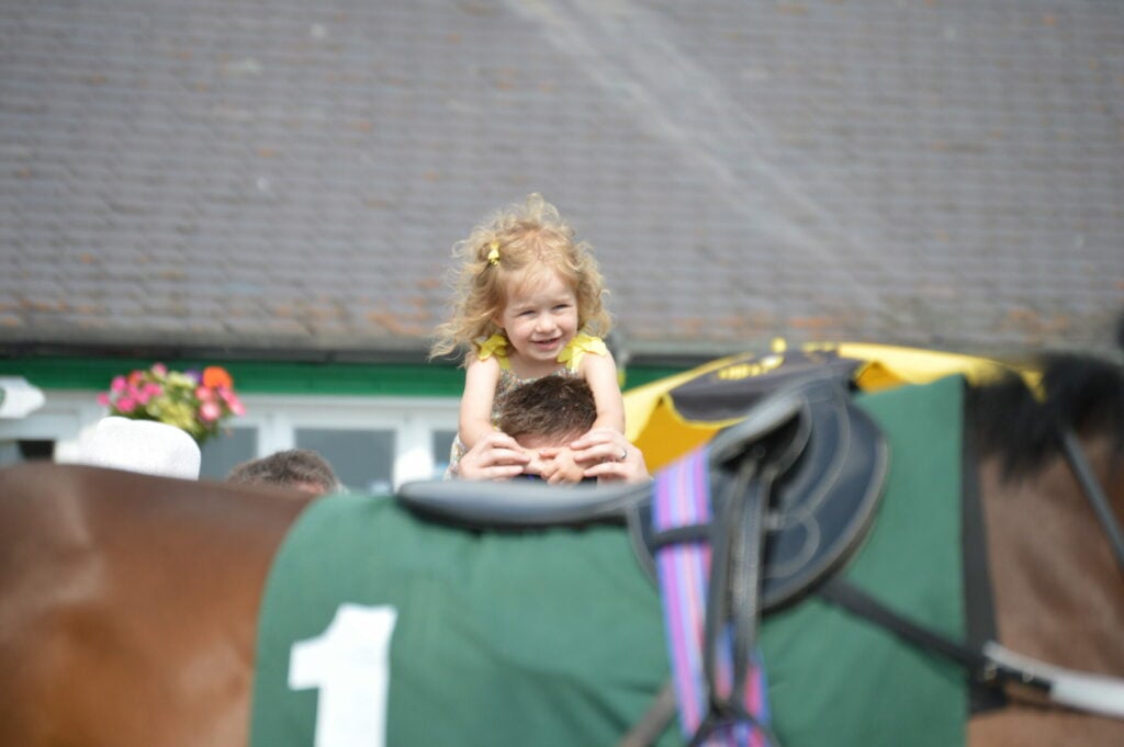 Image name go racing yorkshire horseracing families watching the 5 image from the post Go Racing In Yorkshire in Yorkshire.com.