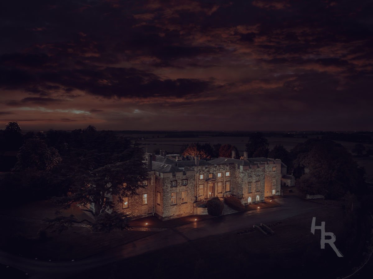 Image name Hazlewood Castle at Dusk 1 the 2 image from the post Hazlewood Castle Ghost Hunt, Dinner, & Sleepover w/ Haunted Rooms in Yorkshire.com.