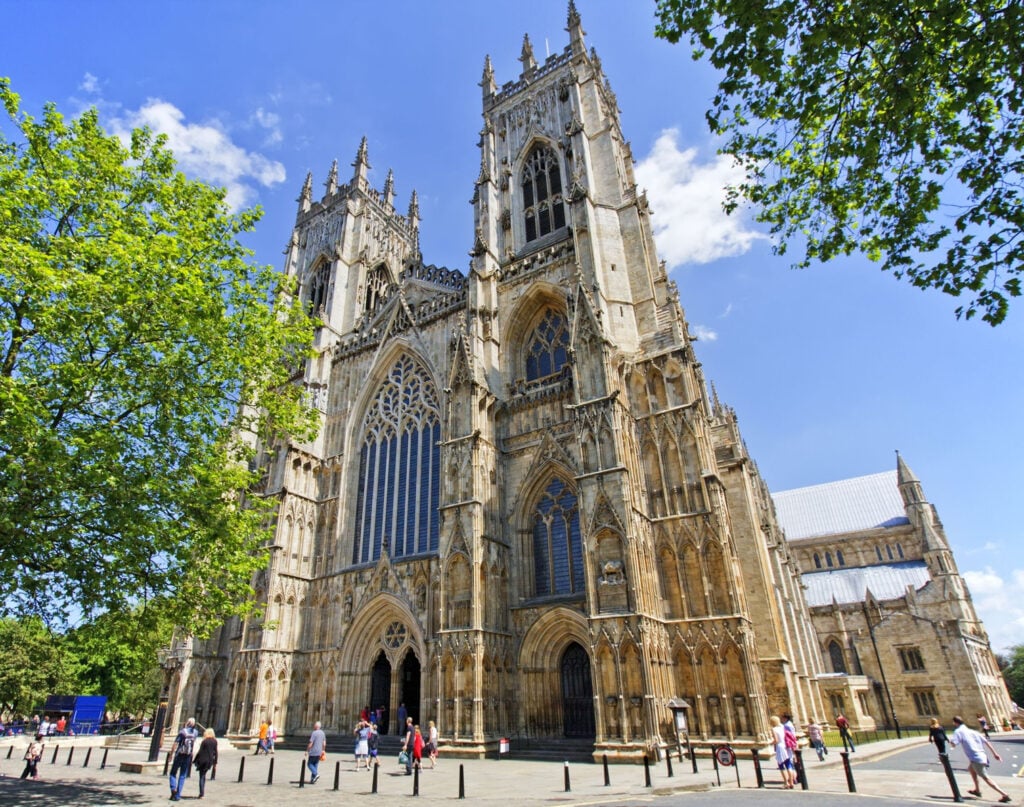 Image name york minster sunny day yorkshire the 20 image from the post The Ultimate List Of Things To Do In York With Young Adults & Teenagers in Yorkshire.com.