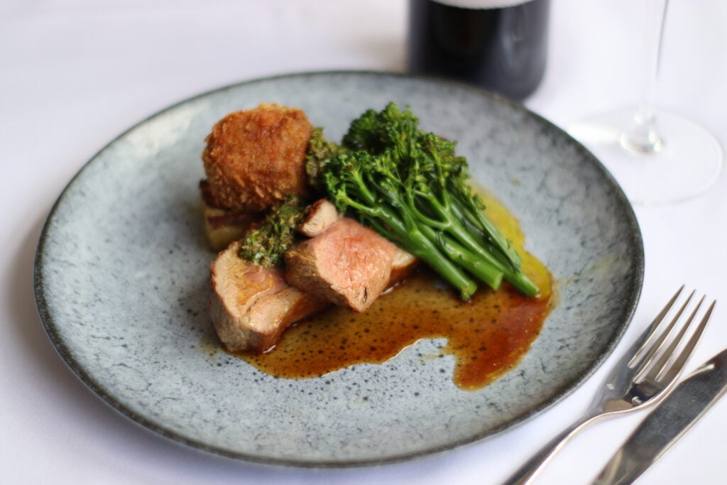 Image name The Devonshire Fell Lamb Rump Shoulder Croquette Potato Gratin Tenderstem Broccolis and Salsa Verde 1 1 the 3 image from the post The Fell Restaurant in Yorkshire.com.