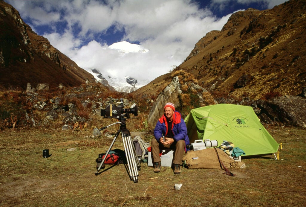 Image name DA campsite Chomolhari behind Image 093 the 1 image from the post Natural History Cameraman, Doug Allan, is coming to Ilkley in Yorkshire.com.