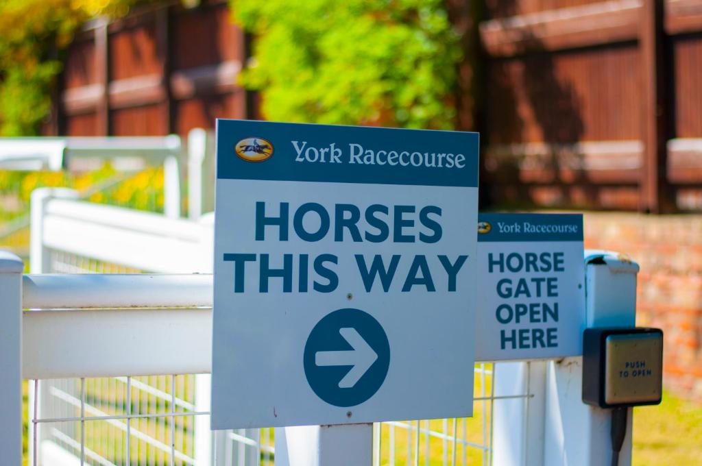 Image name york racecourse sign horses this way yorkshire the 1 image from the post Stableside at York Racecourse in Yorkshire.com.
