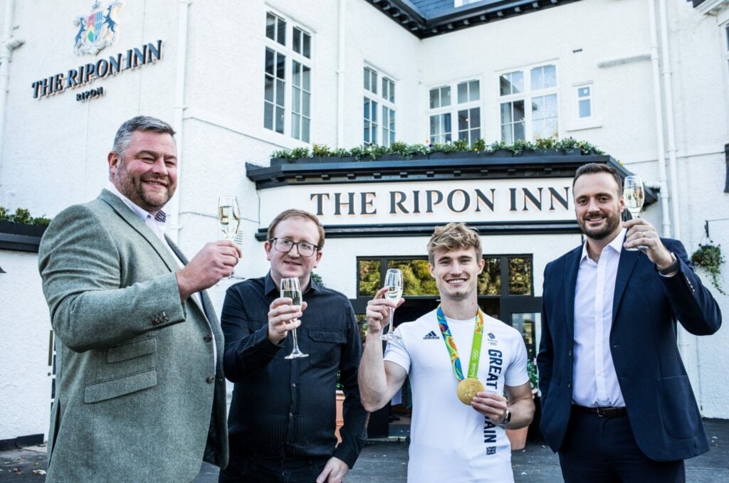 Image name The Ripon Inn. Reopening toast the 6 image from the post THE INN COLLECTION GROUP PRESS RELEASE - Olympic champion Jack dives "inn" to mark Ripon re-opening in Yorkshire.com.