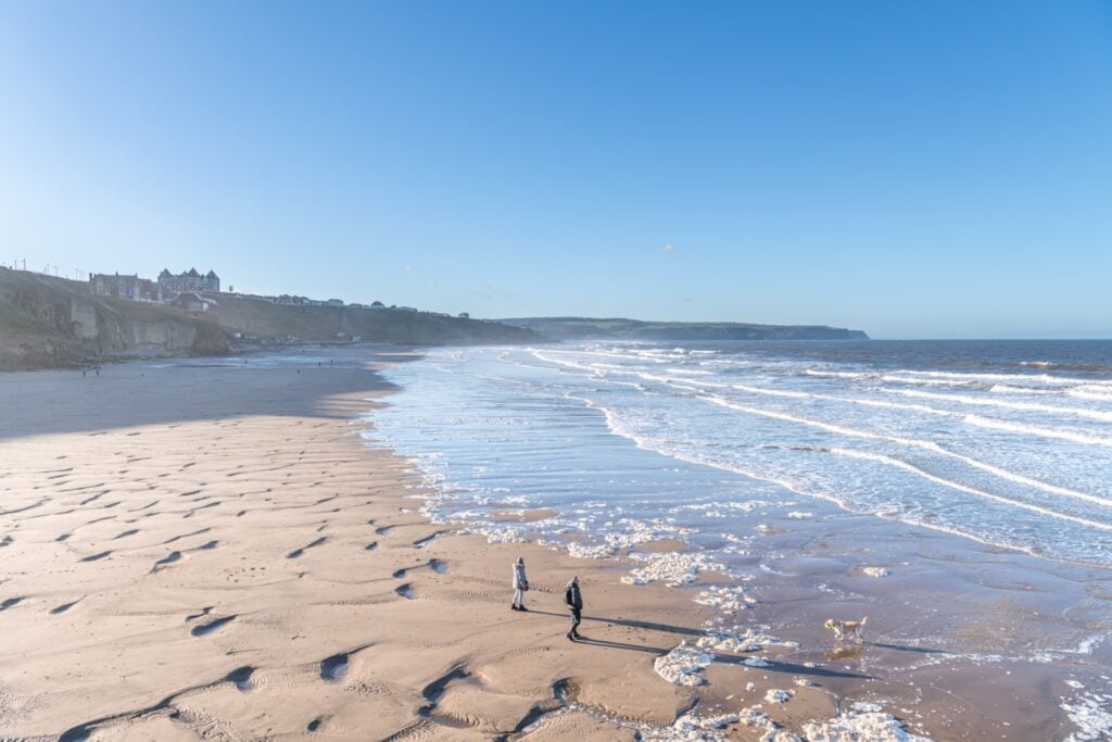 Image name whitby west cliff beach yorkshire 1 the 3 image from the post Welcome to <span style="color:var(--global-color-8);">Y</span>orkshire in Yorkshire.com.