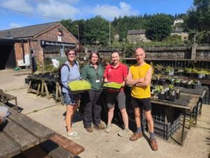 Image name Rangers volunteers and members of the Calderdale Sphagnum Project at the launch of the plant nursery in 2024 the 2 image from the post Peak District in Yorkshire.com.